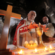 Iraqi priests hold the first mass at the Grand Immaculate Church since it was recaptured from Islamic State in Qaraqosh
